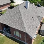 An overhead, drone’s-eye view of the newly replaced roof on Mike. V’s Austin area home.
