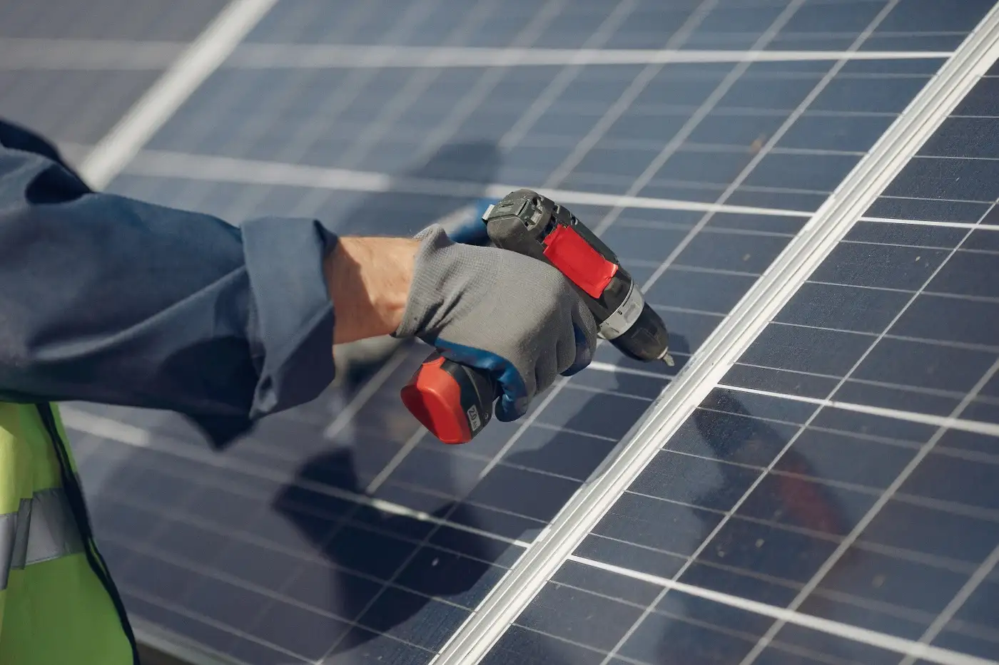 Solar panels installed on an asphalt shingle roof in Central Texas.
